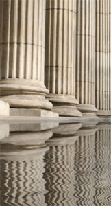 stone columns and their reflections in water